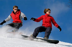 Couple Snowboarding